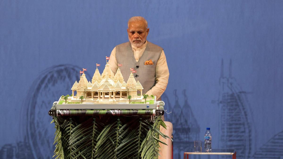Narendra Modi, prime minister of India, unveils a model of the Middle East's first traditional Hindu stone temple in Abu Dhabi