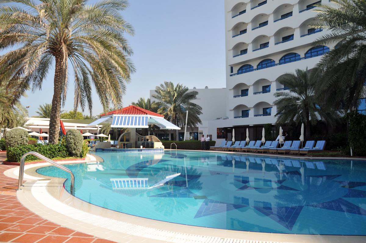 Kempinski Hotel, Ajman Review - Relax while sitting at pool area