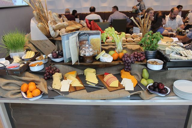 The Art of Brunch - An artfully arranged cheese and grape table